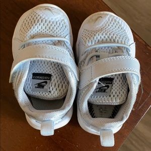 Light blue Nike Velcro shoes in baby size 4